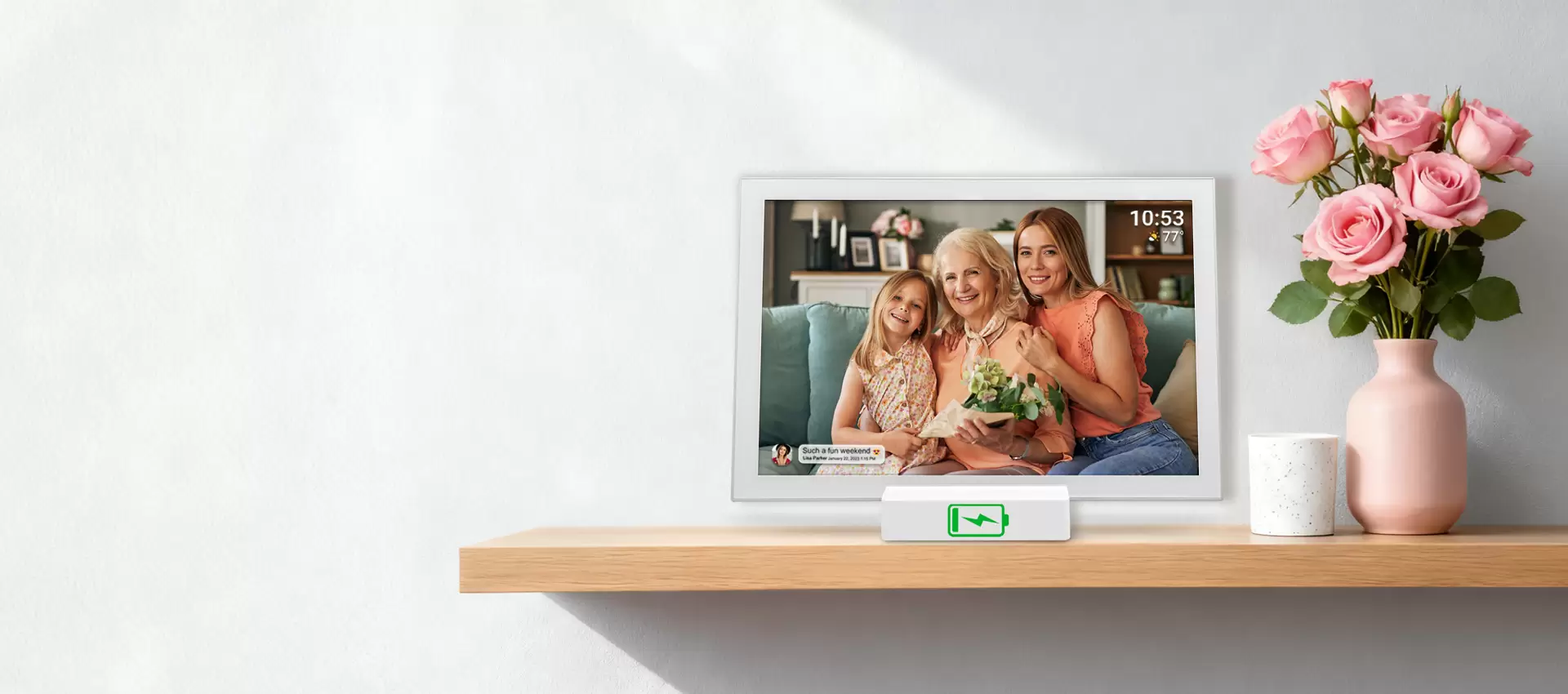 Battery-powered photo frame on a shelf with flowers